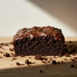 Chocolate kefir sheet cake sliced on a wooden table