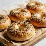Sourdough bagels with mixed toppings and center text